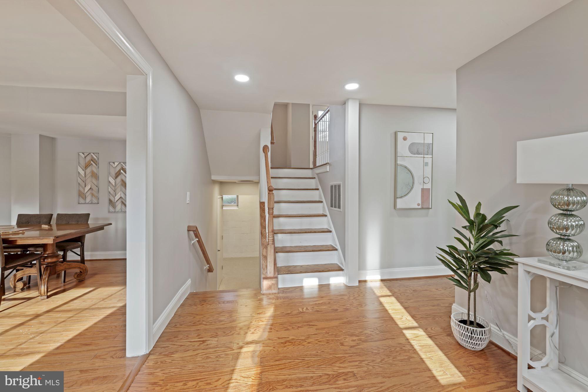 7716 Beech Tree Road Bethesda, MD 20817 - Photo 13 of 49 a view of entryway with livingroom and stairs