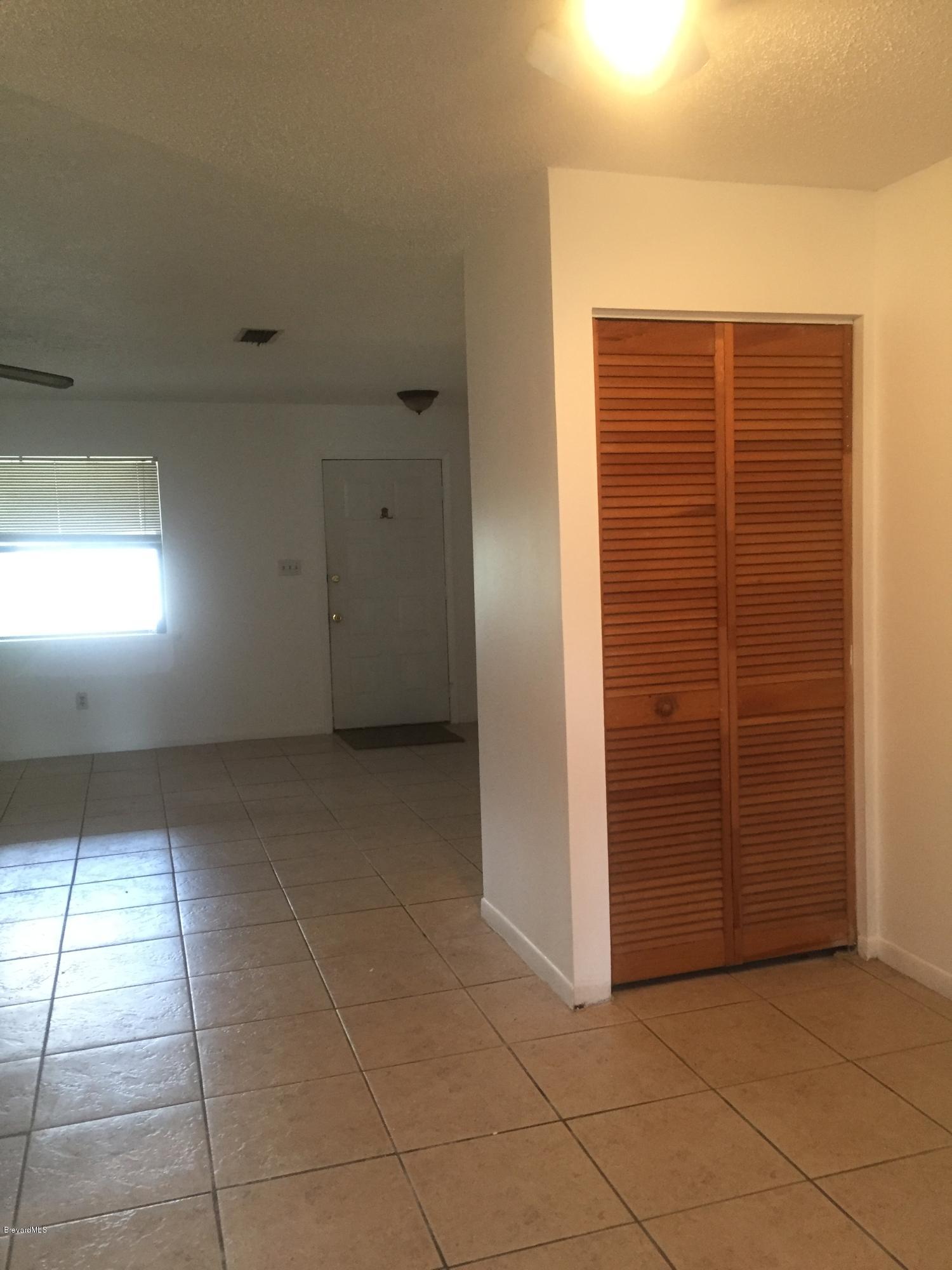 5448 Flint Road Cocoa, FL 32927 - Photo 14 of 35 Air Handler/Storage Area