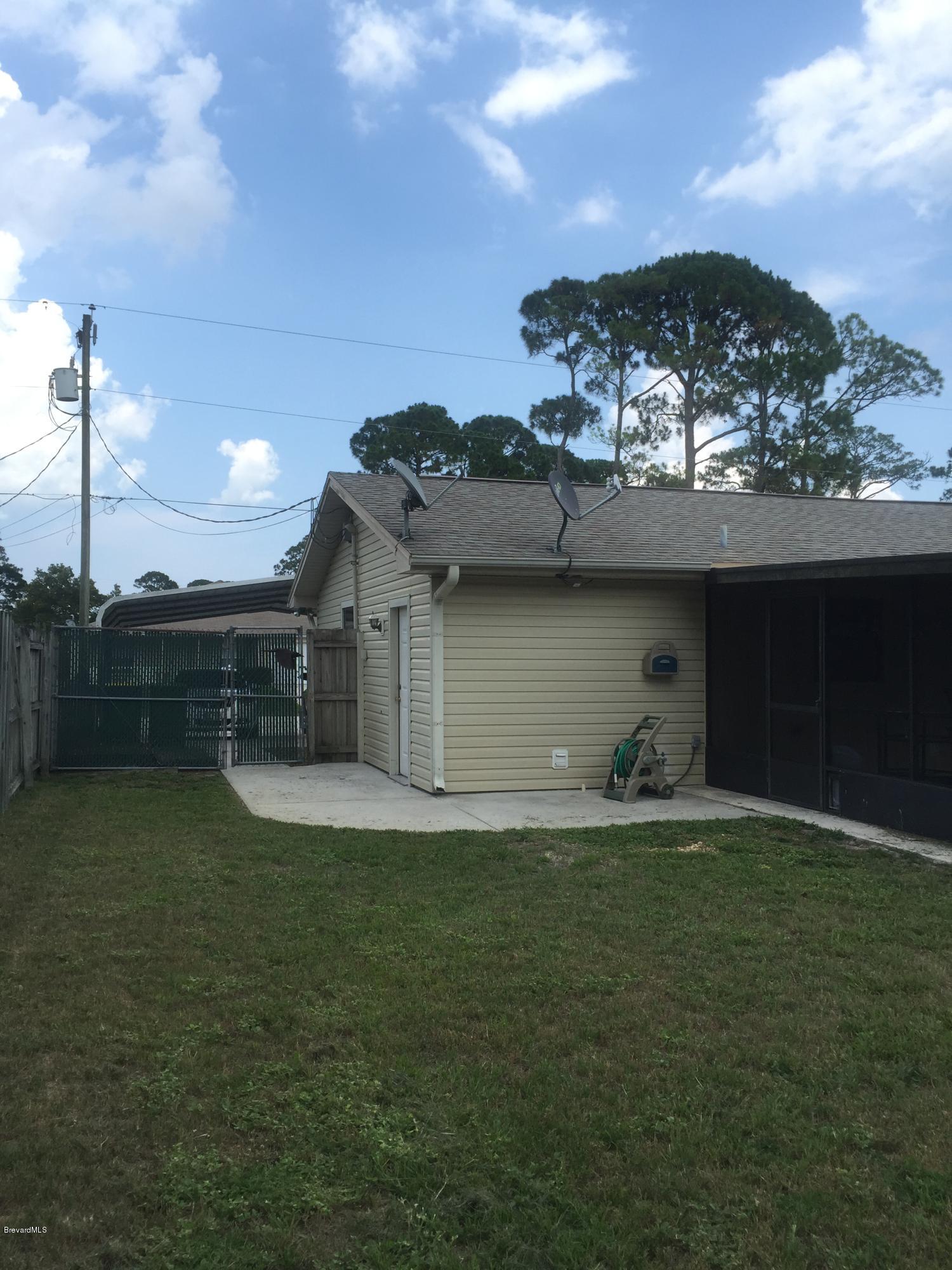 5448 Flint Road Cocoa, FL 32927 - Photo 3 of 35 Side of Home