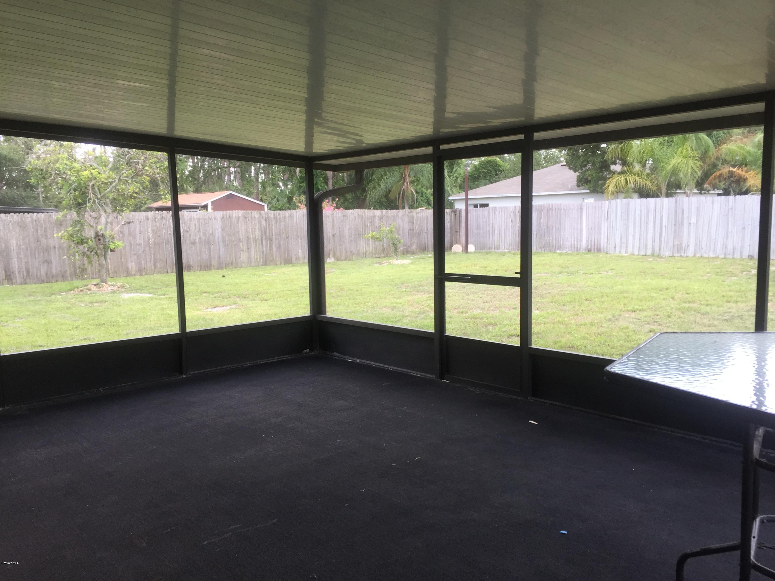 5448 Flint Road Cocoa, FL 32927 - Photo 29 of 35 Screened in Porch
