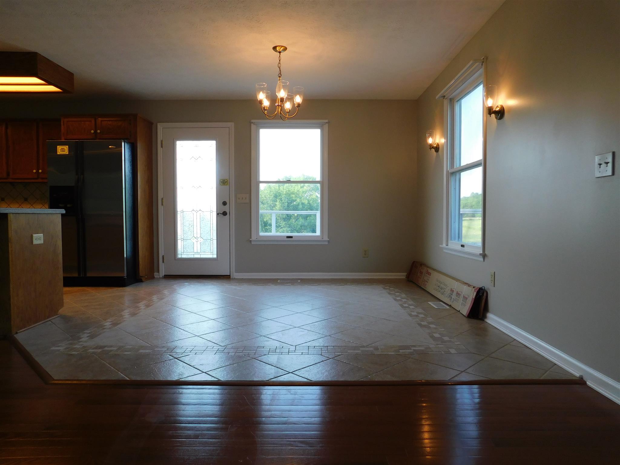 2470 Ben Green Road Lebanon, TN 37090 - Photo 13 of 24 an empty room with wooden floor and windows