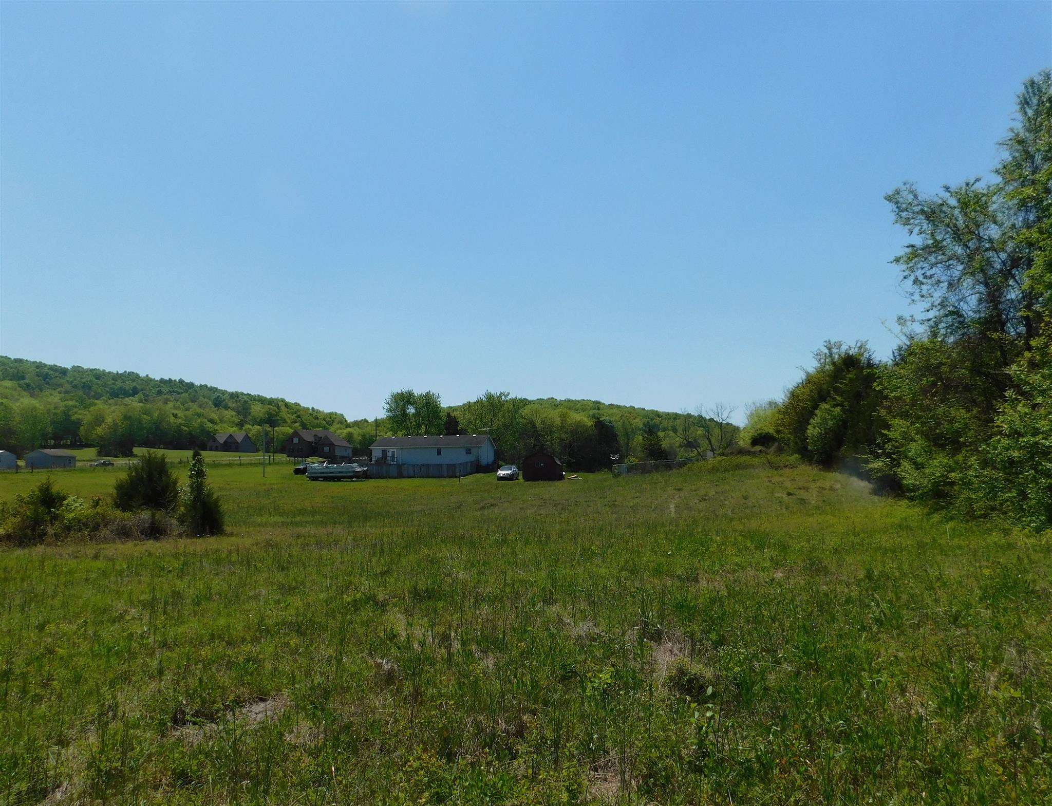2470 Ben Green Road Lebanon, TN 37090 - Photo 7 of 24 a view of a lake and green valley