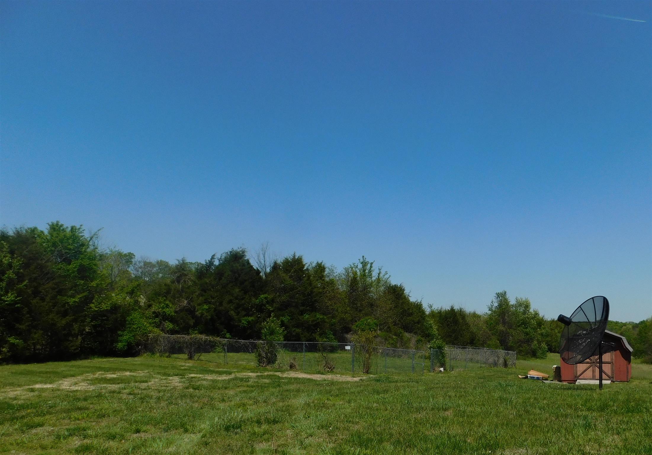 2470 Ben Green Road Lebanon, TN 37090 - Photo 8 of 24 a backyard of a house with lots of green space