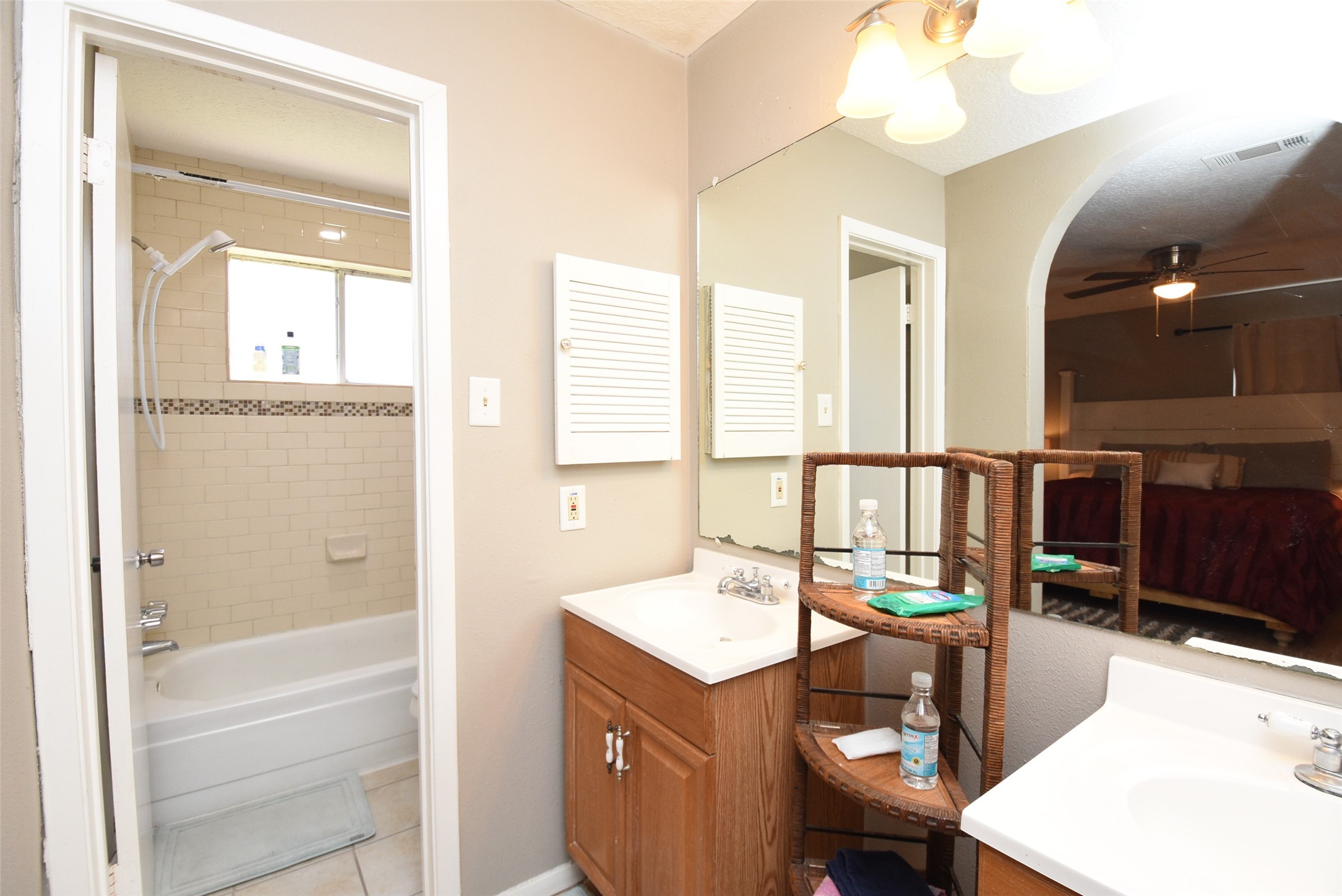 20003 Bolton Bridge Lane Humble, TX 77338 - Photo 9 of 33 a en suite bathroom with a sink double vanity and a mirror