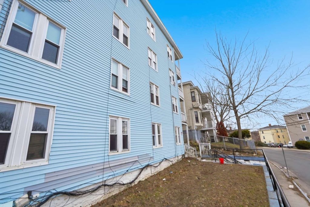 573 Main Street Southbridge, MA 01550 - Photo 9 of 15 a view of a house with a yard