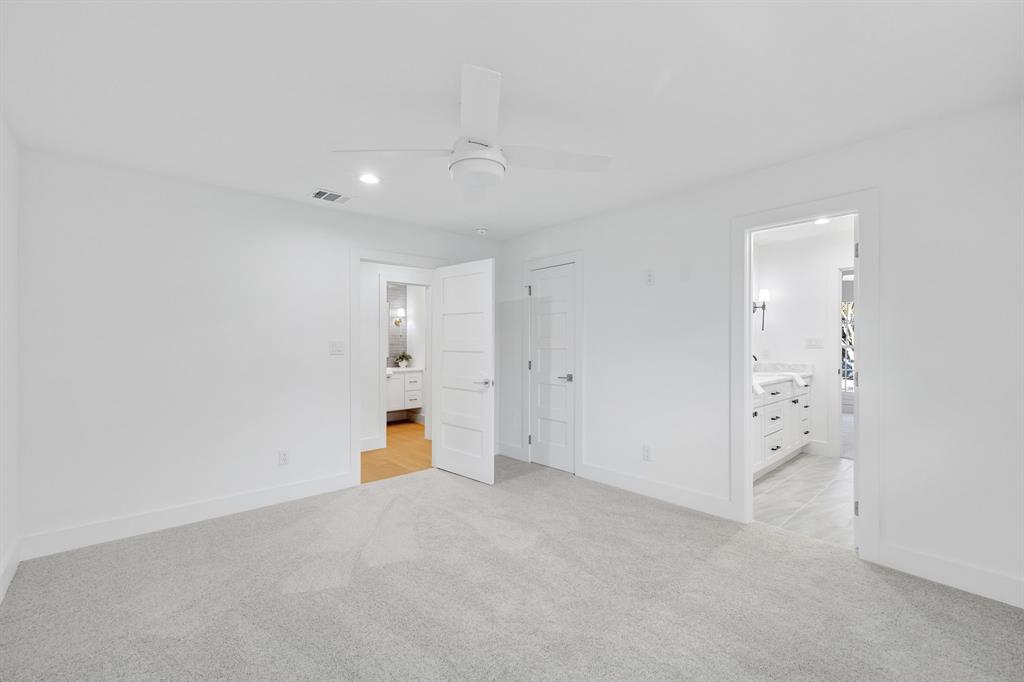 7124 Meadow Road Dallas, TX 75230 - Photo 26 of 39 a view of an empty room