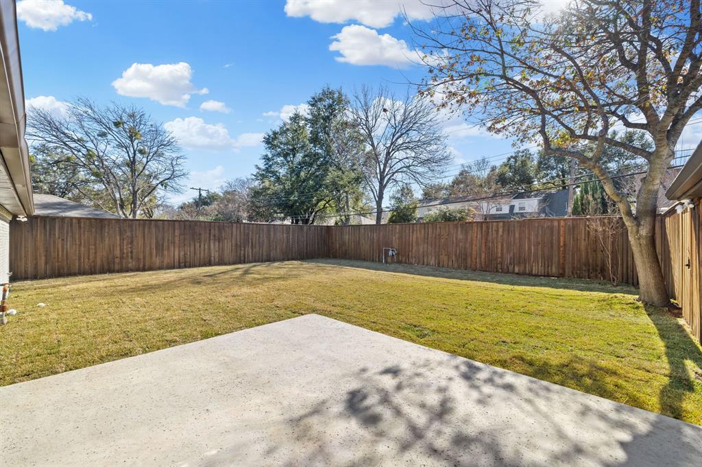 7124 Meadow Road Dallas, TX 75230 - Photo 34 of 39 a view of swimming pool with back yard