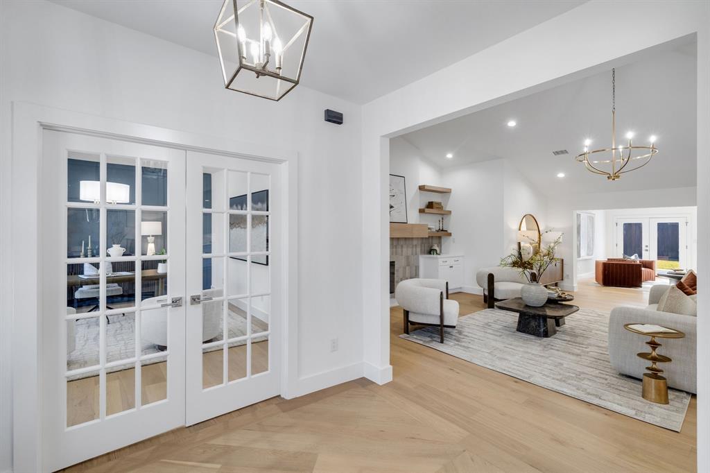 7124 Meadow Road Dallas, TX 75230 - Photo 5 of 39 a living room with furniture
