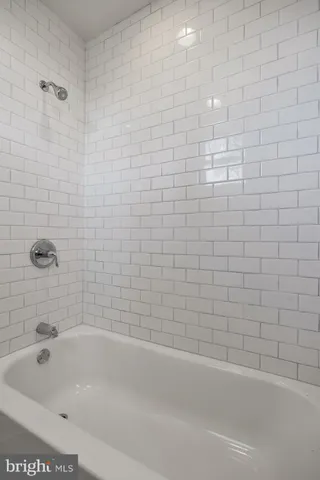 a bathroom with a bathtub