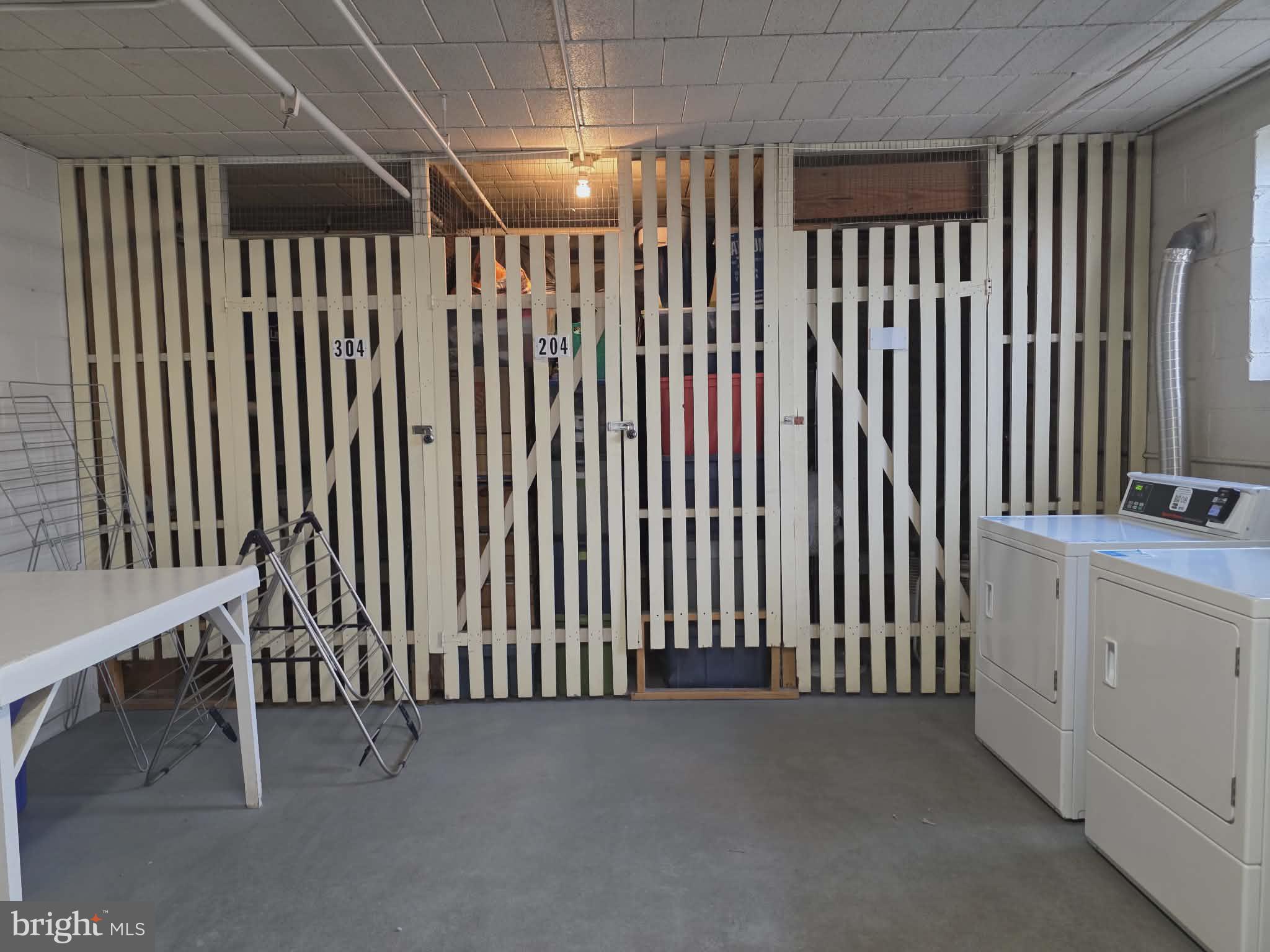 412 North Wayne Avenue, Unit 109 Wayne, PA 19087 - Photo 17 of 20 a view of an empty room with a window