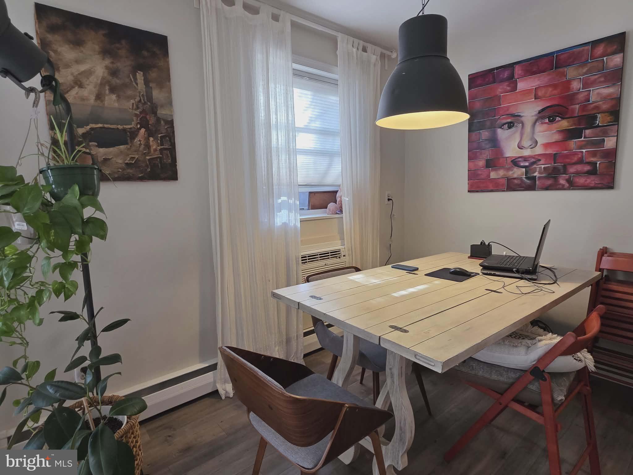 412 North Wayne Avenue, Unit 109 Wayne, PA 19087 - Photo 4 of 20 a view of a workspace with furniture