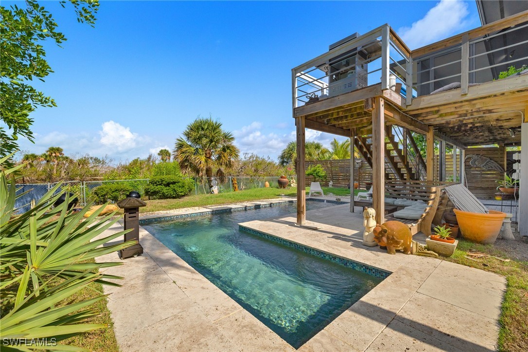 771 Rabbit Road Sanibel, FL 33957 - Photo 25 of 35 a view of a park with swings and slides