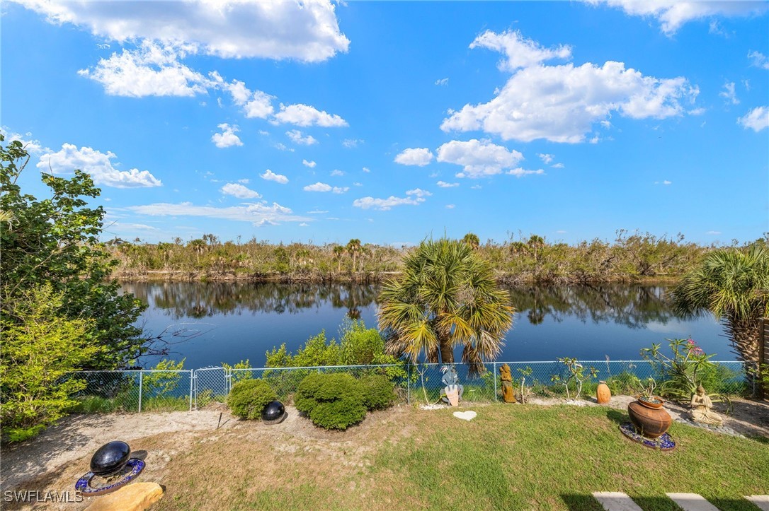 771 Rabbit Road Sanibel, FL 33957 - Photo 27 of 35 a view of a houses with a yard