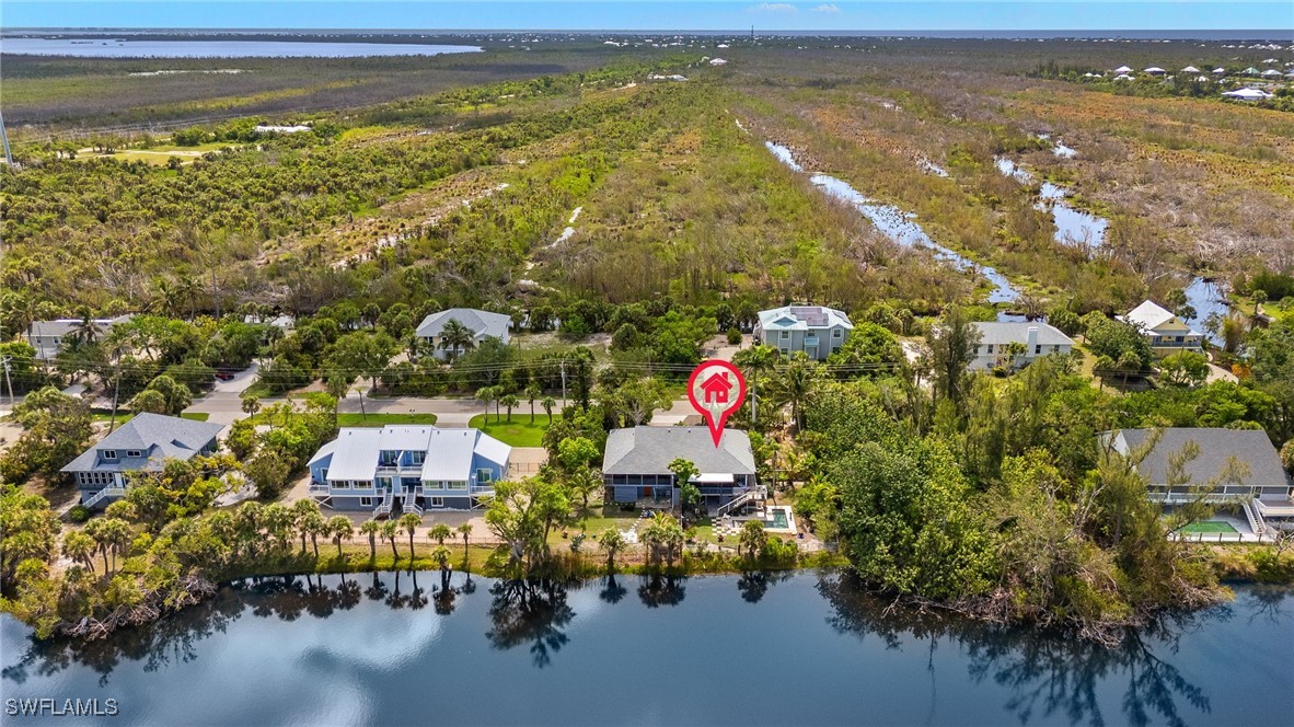 771 Rabbit Road Sanibel, FL 33957 - Photo 29 of 35 a picture of city and ocean