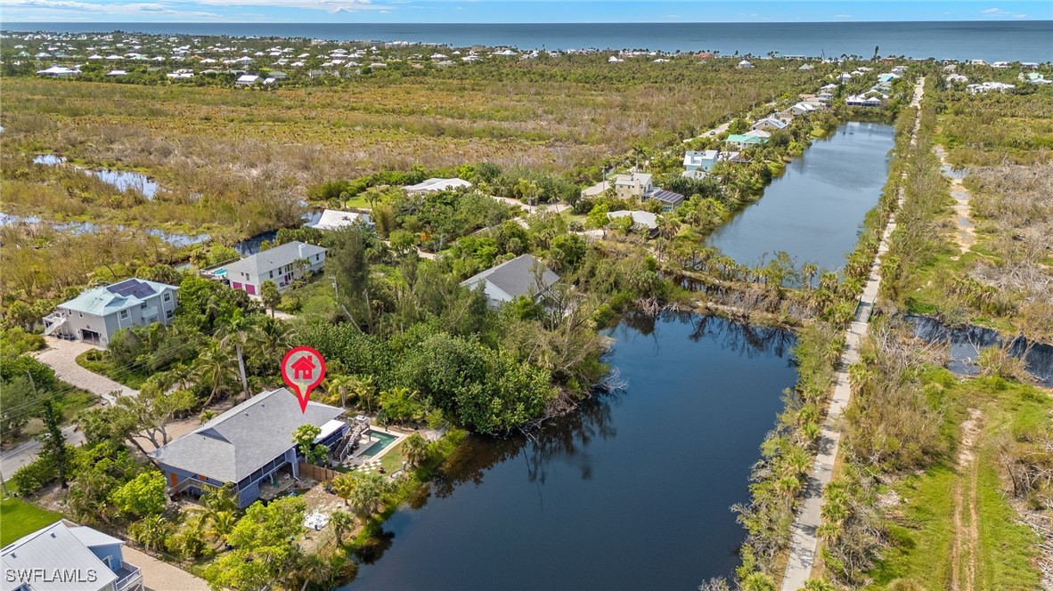 771 Rabbit Road Sanibel, FL 33957 - Photo 30 of 35 an aerial view of ocean residential house with outdoor space