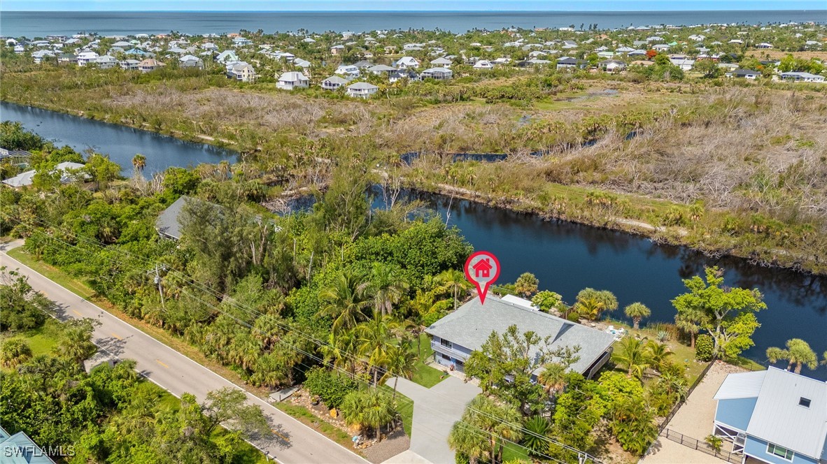 771 Rabbit Road Sanibel, FL 33957 - Photo 32 of 35 a view of a lake from a balcony