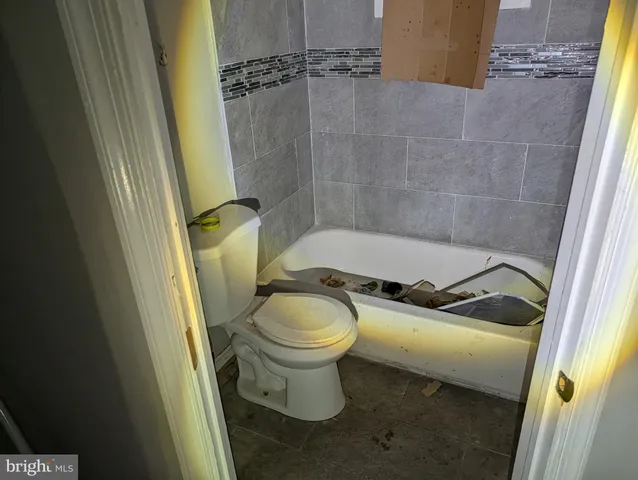a bathroom with a sink and toilet