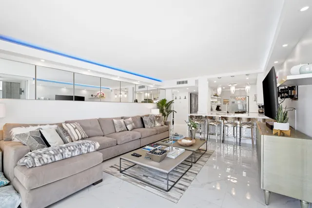 a living room with furniture and a couch