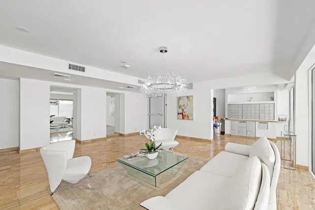 a bathroom with a shower and a sink
