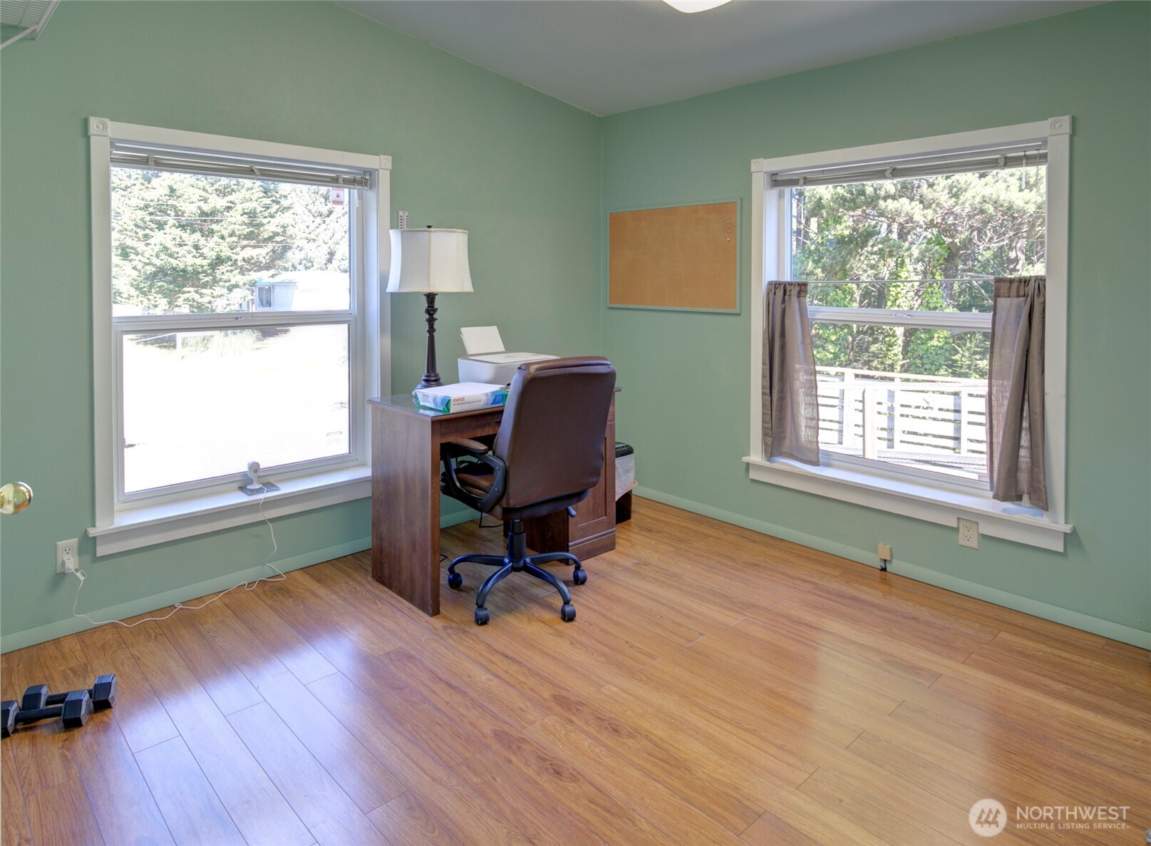 1362 Oceano Drive Grayland, WA 98547 - Photo 19 of 35 a view of a workspace with wooden floor and a window