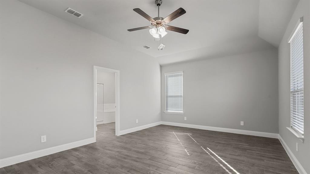 11209 Treehouse Trail Justin, TX 76247 - Photo 14 of 40 a view of an empty room with a window