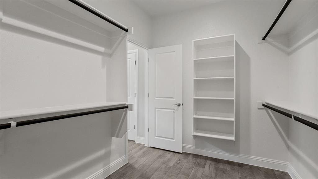 11209 Treehouse Trail Justin, TX 76247 - Photo 22 of 40 a view of walk in closet