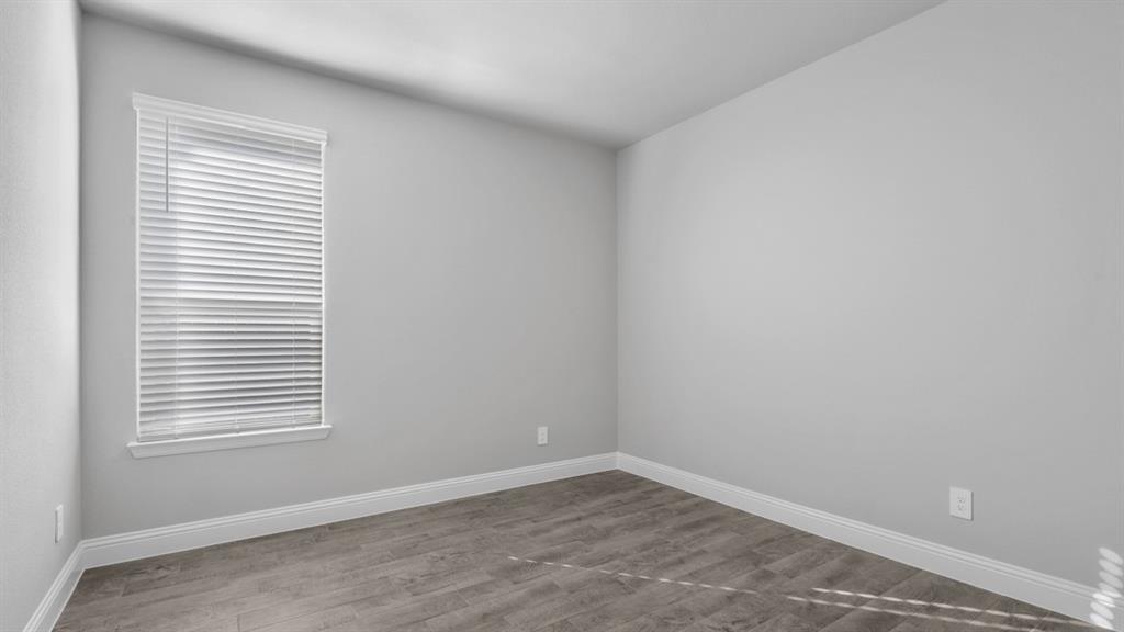 11209 Treehouse Trail Justin, TX 76247 - Photo 24 of 40 an empty room with a window
