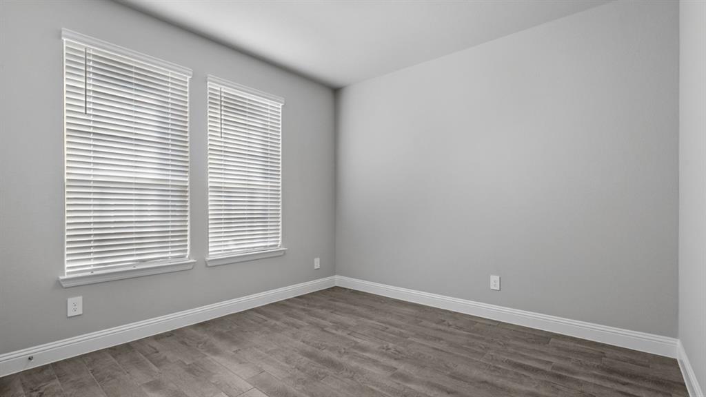 11209 Treehouse Trail Justin, TX 76247 - Photo 33 of 40 an empty room with a window