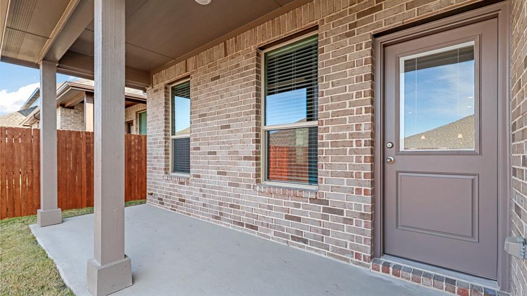 11209 Treehouse Trail Justin, TX 76247 - Photo 36 of 40 a view of front door of house