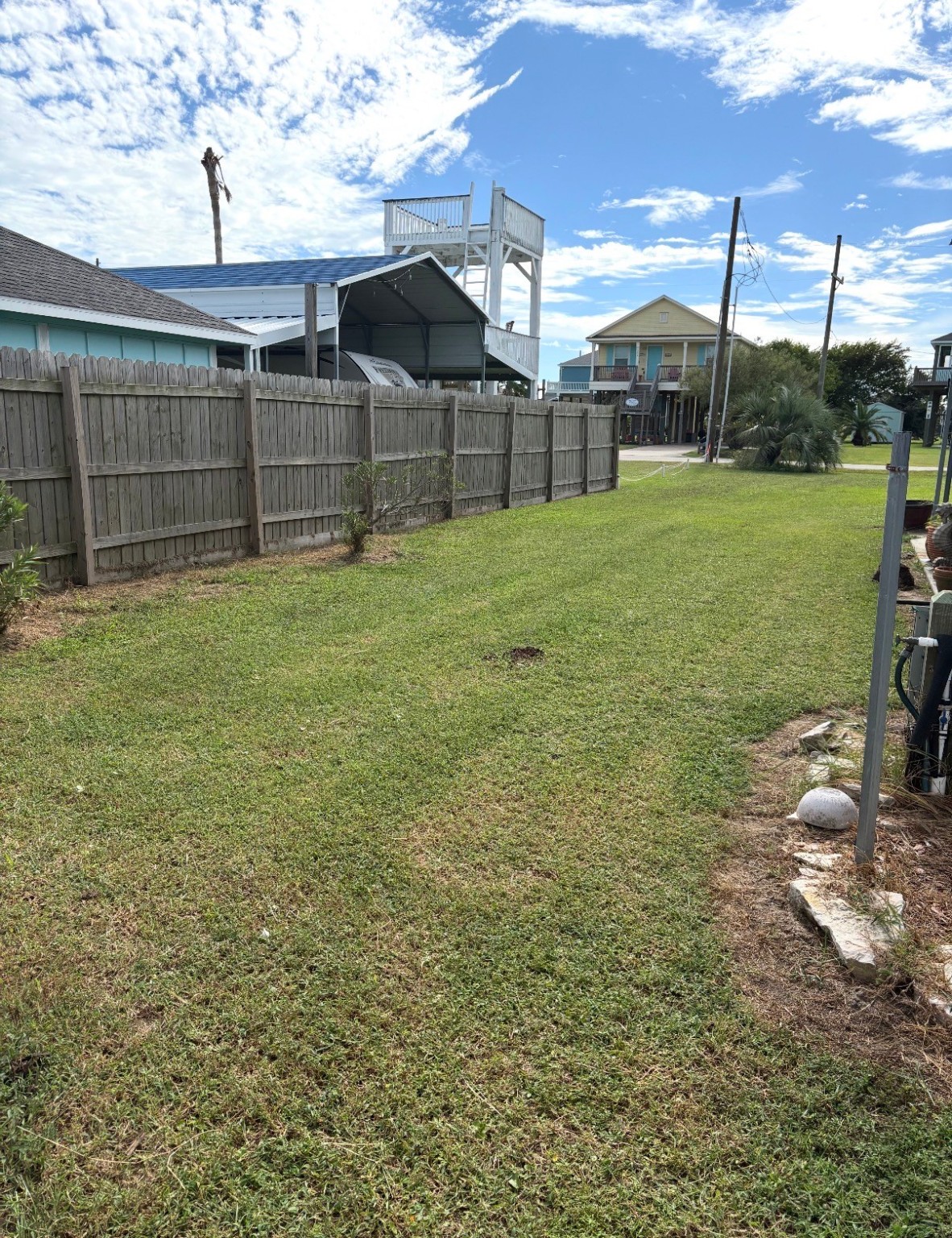 920 South Sage Road Crystal Beach, TX 77650 - Photo 2 of 6 a view of a backyard