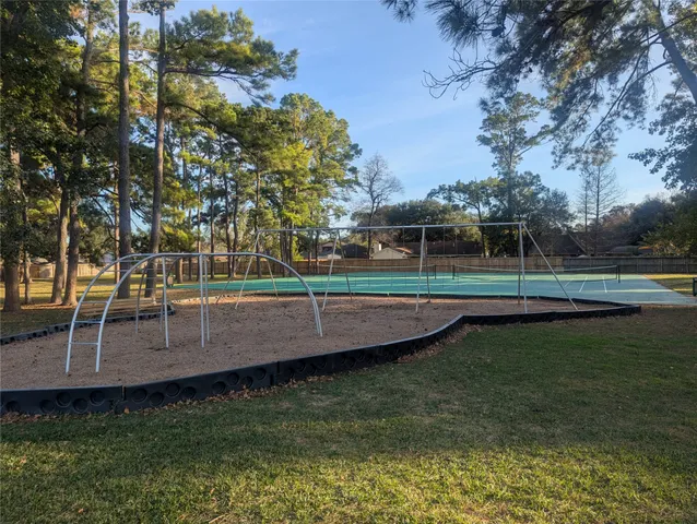 a view of a street with a building in the background