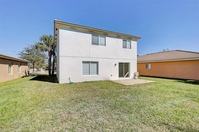 a house view with a garden space