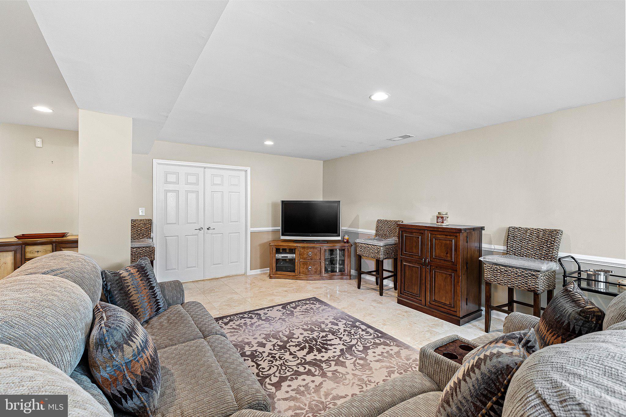 209 Glenshee Drive Townsend, DE 19734 - Photo 20 of 37 Finished Lower Level with Marble Flooring
