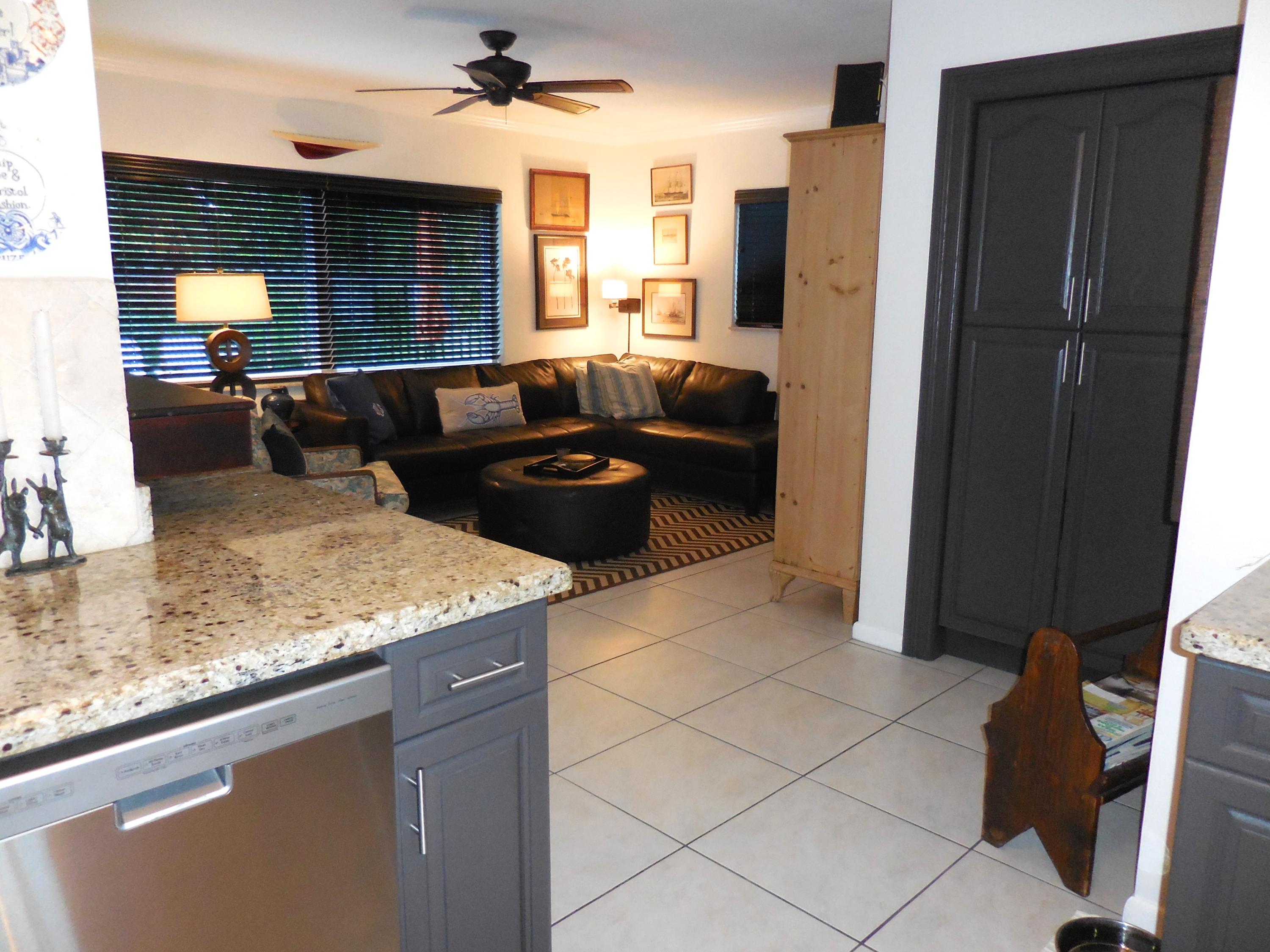 884 Northwest 7th Street Boca Raton, FL 33486 - Photo 11 of 32 kitchen to fam rm