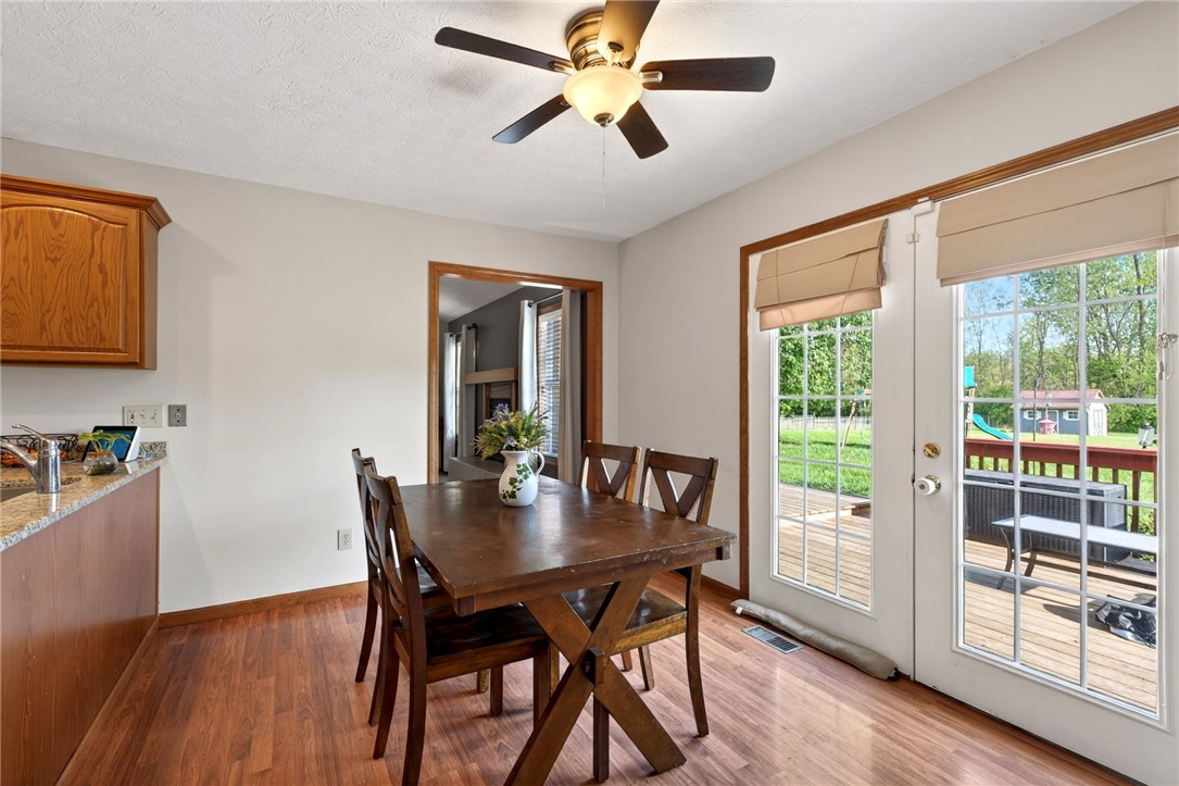 4996 Shannon Avenue Springfield, OH 45504 - Photo 26 of 61 This inviting dining area features warm flooring and direct outdoor access.