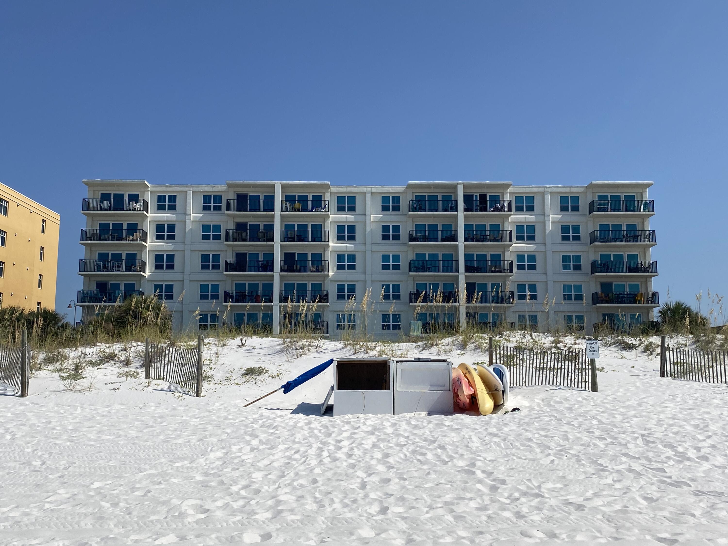 1114 Santa Rosa Boulevard, Unit 208 Fort Walton Beach, FL 32548 - Photo 52 of 73 a view of building with swimming pool