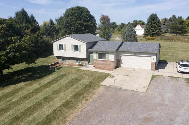 $345,000 | 535 North Hacker Road, Howell, MI 48843