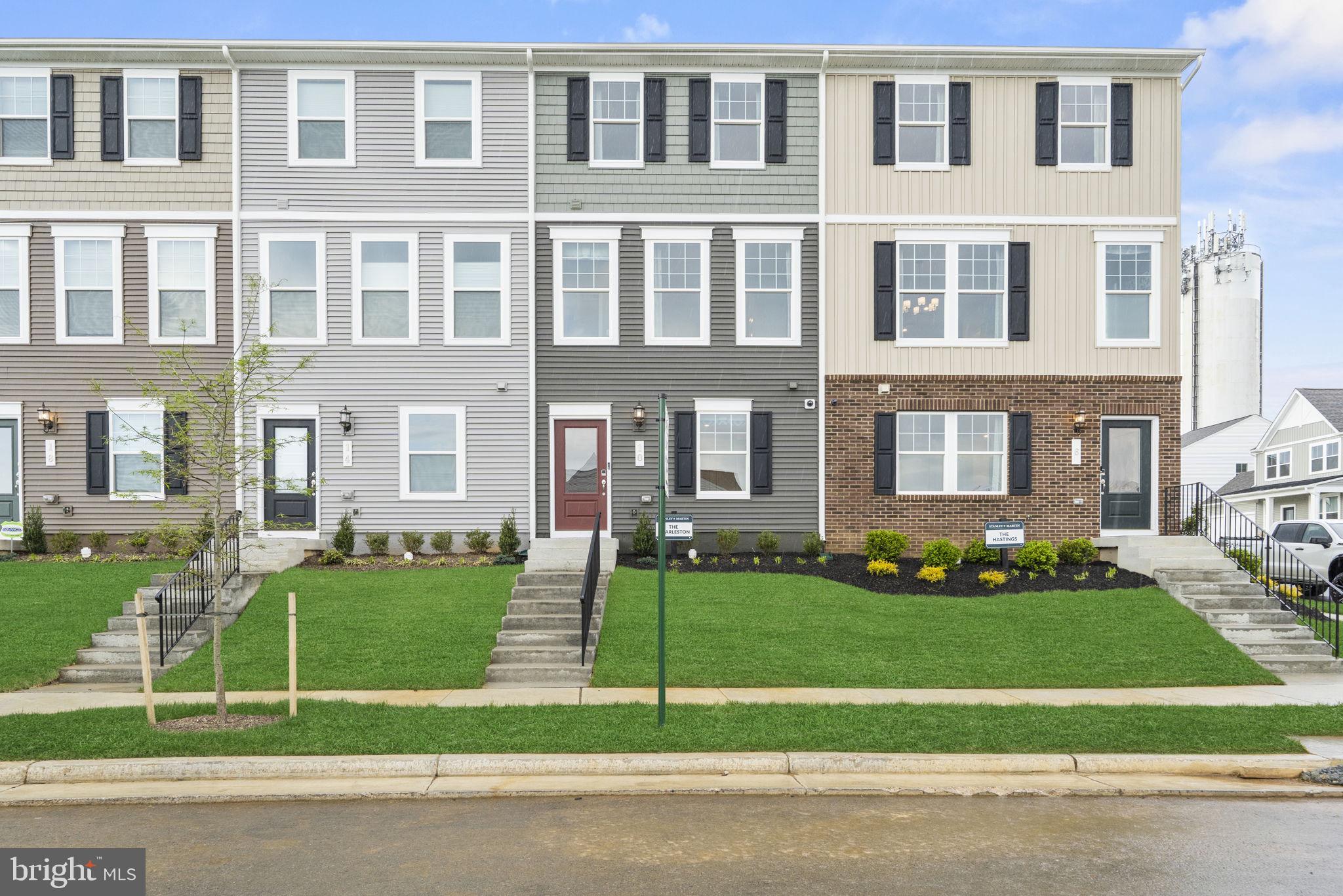 360 Anthem Street, Unit 445 Ranson, WV 25438 - Photo 73 of 87 a view of a building with a yard
