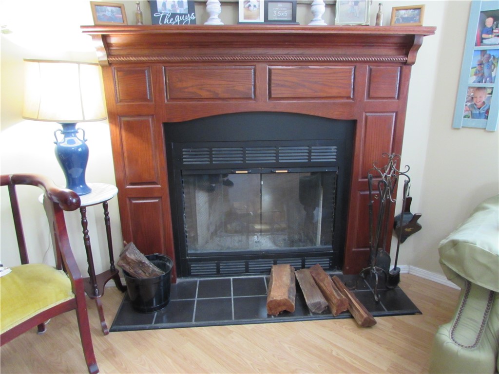 3239 Bob Bowen Road Blackshear, GA 31516 - Photo 12 of 34 Enjoy a cozy winter evening with this pretty fireplace.