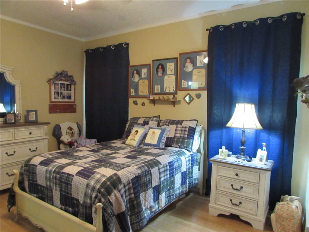 3239 Bob Bowen Road Blackshear, GA 31516 - Photo 16 of 34 The primary bedroom has 2 windows. It also has a walk-in closet. Another walk-in closet is found in the primary bath.