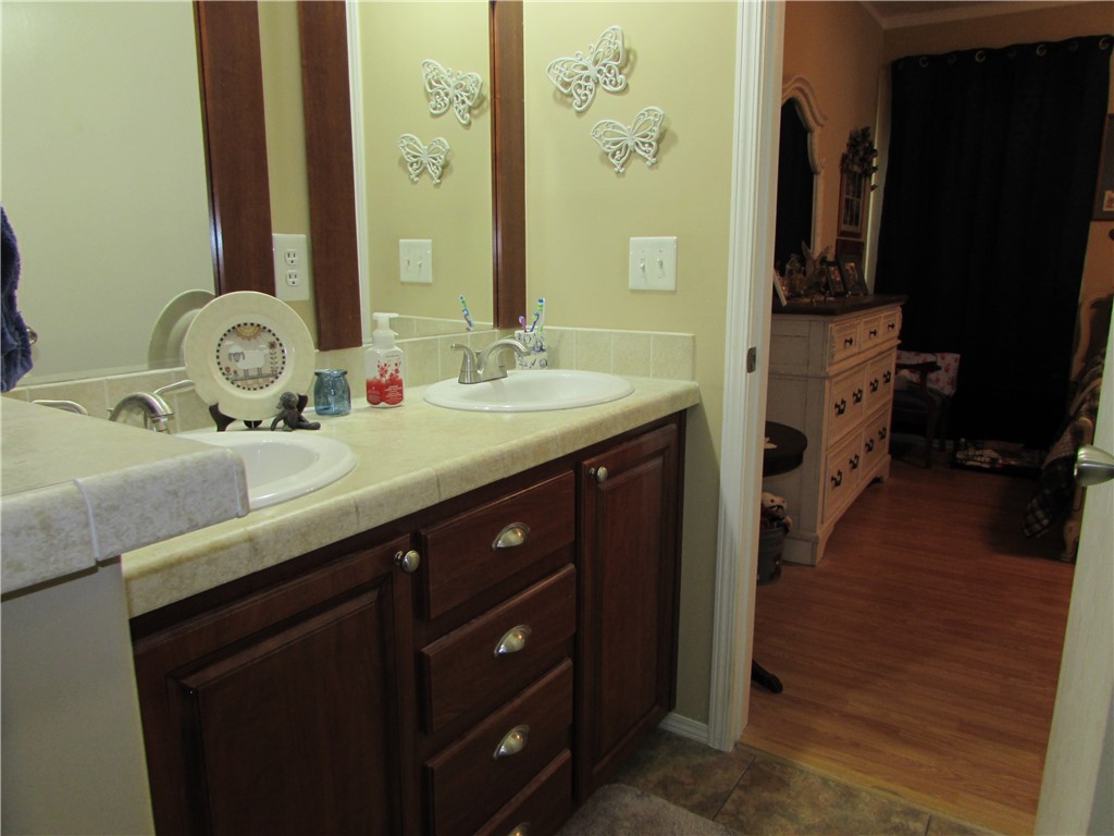 3239 Bob Bowen Road Blackshear, GA 31516 - Photo 21 of 34 Primary bath has a double vanity.