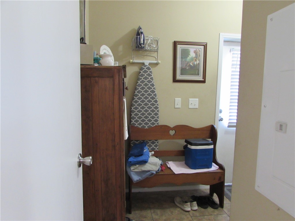 3239 Bob Bowen Road Blackshear, GA 31516 - Photo 27 of 34 Laundry/Mud Room has plenty of room for a bench to take off shoes.