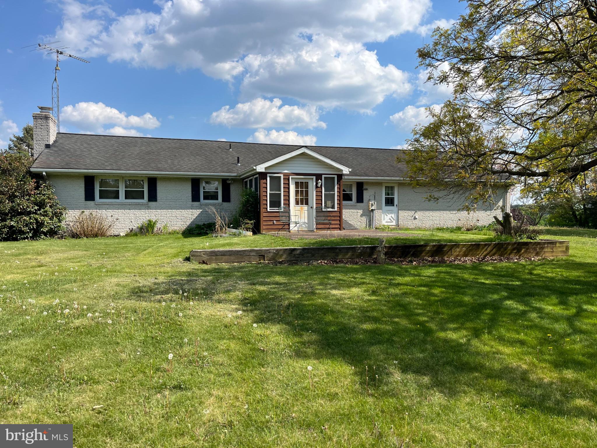 4996 Wentz Road Manchester, MD 21102 - Photo 6 of 8 a front view of house with yard and trees