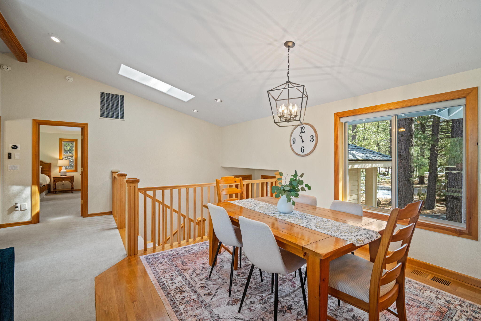 17948 Shadow Lane, Unit 7 Sunriver, OR 97707 - Photo 24 of 92 a view of a dining room with furniture window and wooden floor
