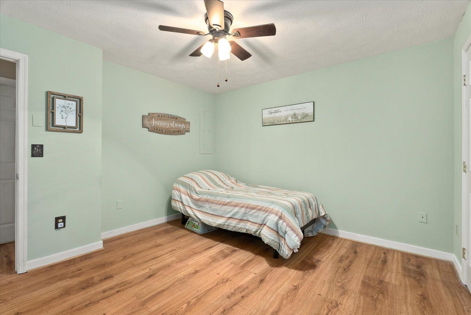 13 Buckboard Road Waynesboro, VA 22980 - Photo 20 of 29 a bedroom with a bed and wooden floor