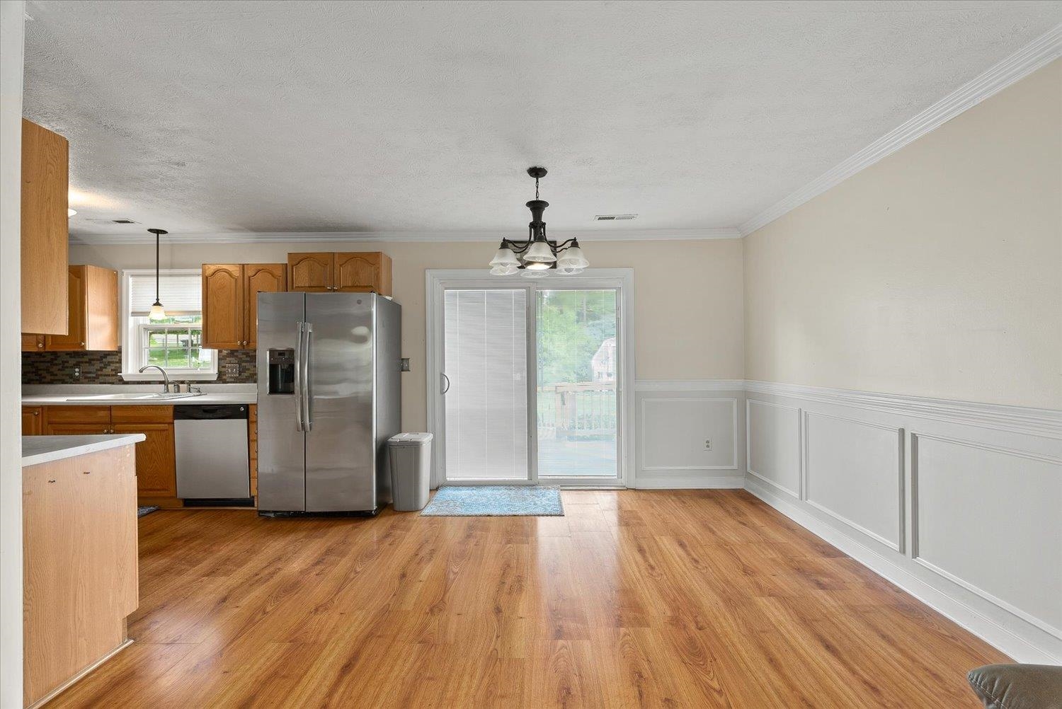 13 Buckboard Road Waynesboro, VA 22980 - Photo 10 of 29 a kitchen with a refrigerator and wooden floor