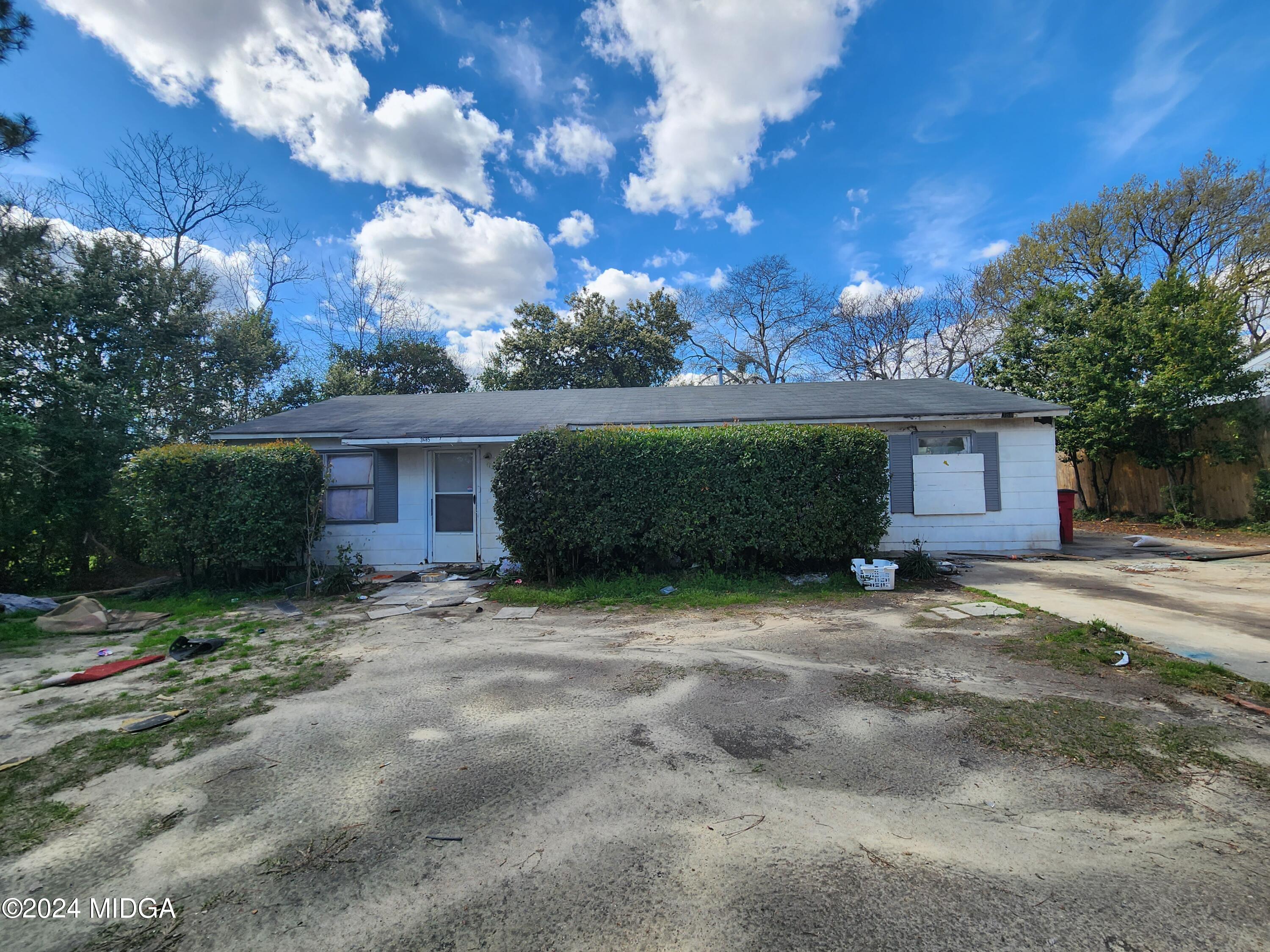 3685 Rice Mill Road Macon, GA 31206 - Photo 1 of 24 a view of a house with a yard