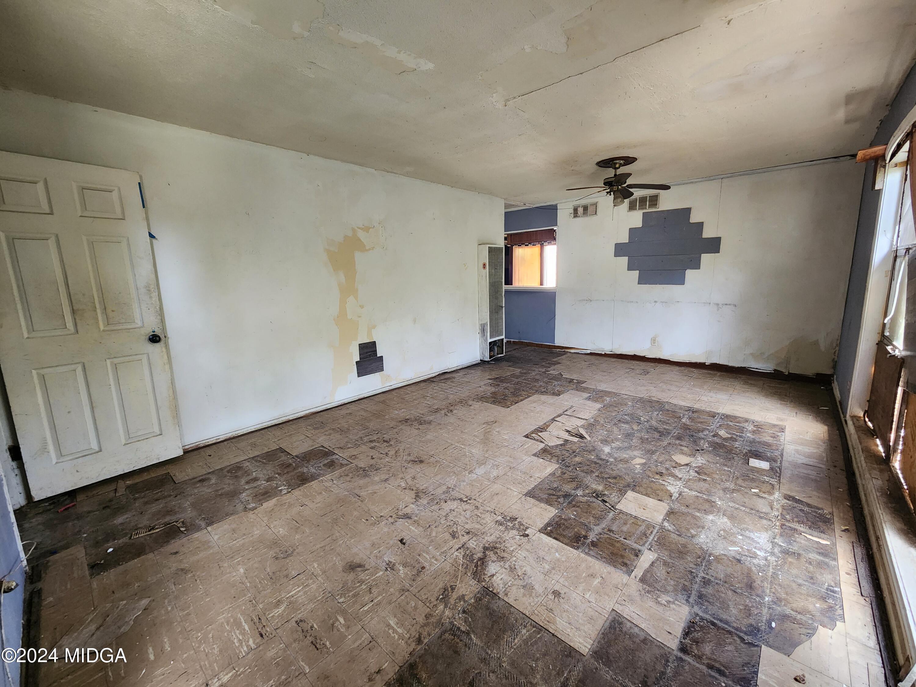 3685 Rice Mill Road Macon, GA 31206 - Photo 3 of 24 a view of empty room with wooden floor