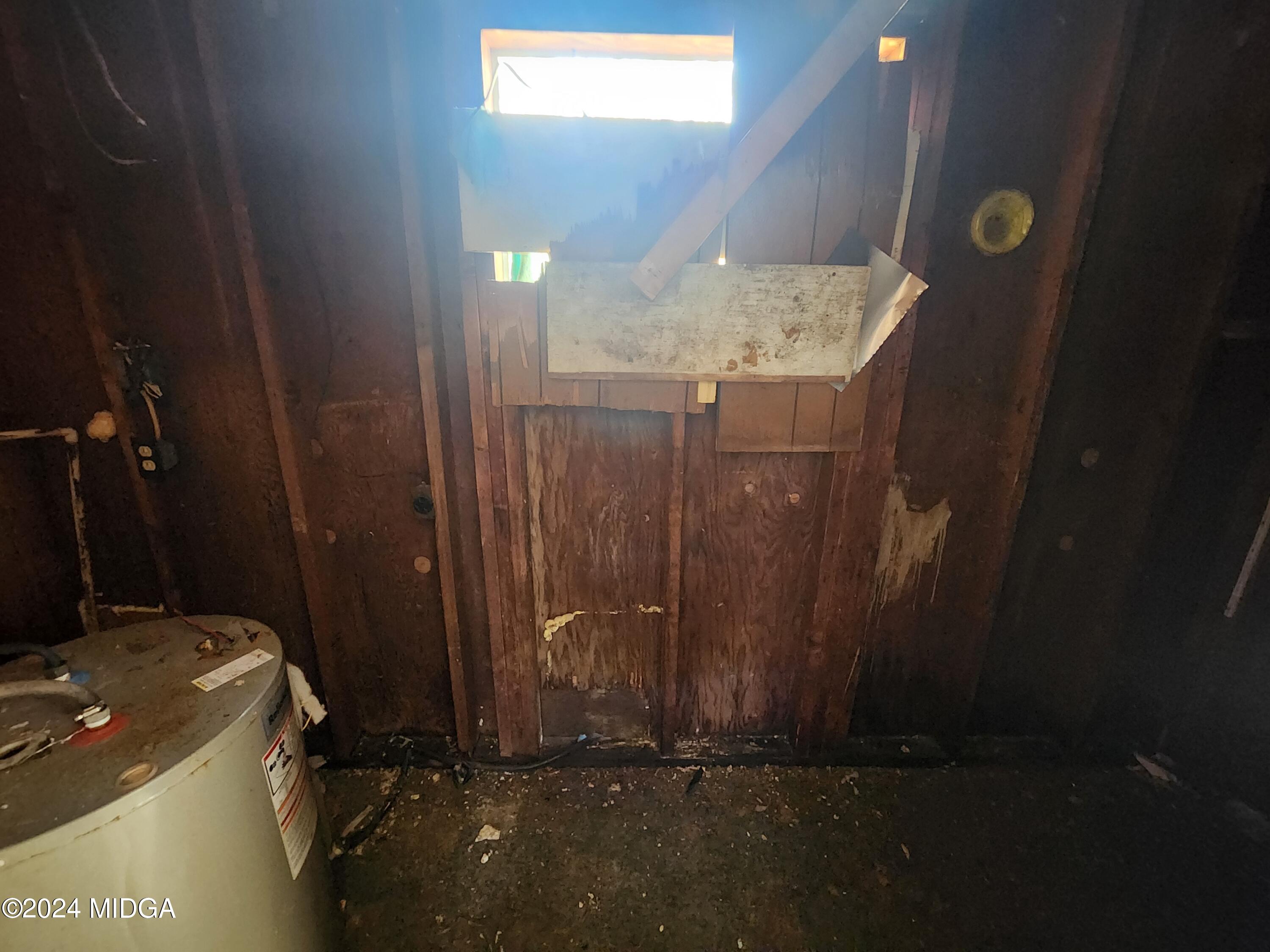 3685 Rice Mill Road Macon, GA 31206 - Photo 10 of 24 a bathroom with a granite countertop sink and a mirror