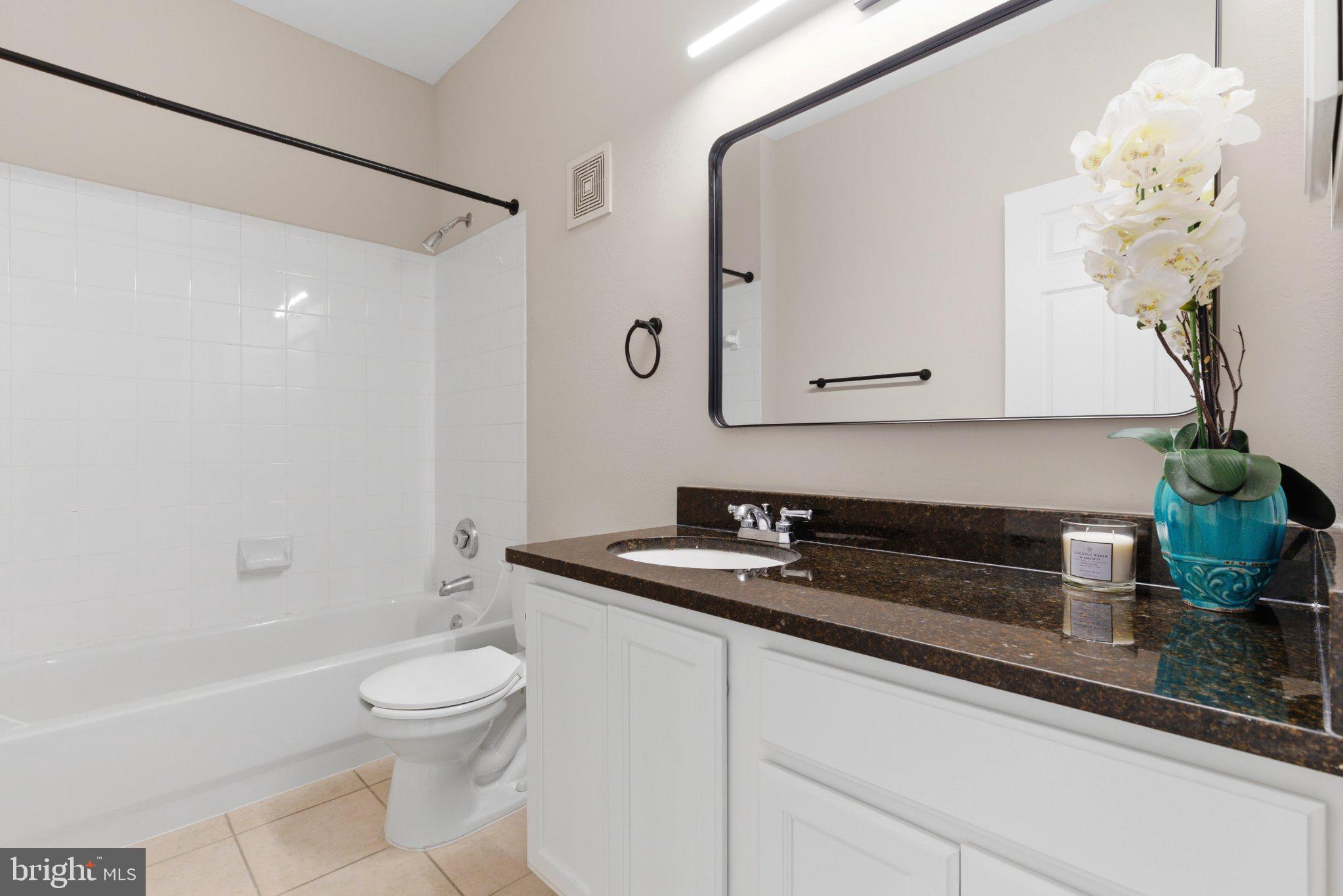 1580 Spring Gate Dr., Unit 4303 McLean, VA 22102 - Photo 15 of 41 Modern bathroom with elegant finishes.
